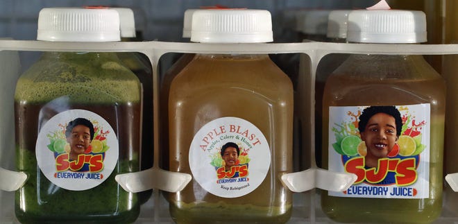 SJ’s Everyday Juice for sale inside Mic's Mini Market on West May Avenue Tuesday afternoon, July 20, 2021.