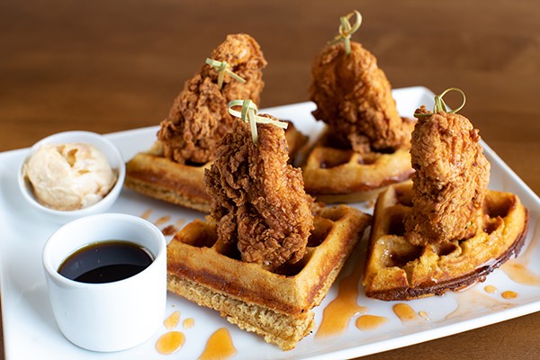 Chicken and waffles with buttermilk fried chicken, waffle, hot honey and cinnamon butter. - MABEL SUEN