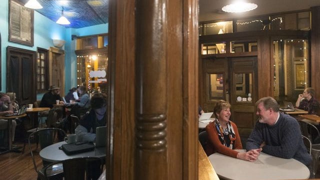 Steve and Lisa Skinner spend part of an evening at Old City Java. The two sold their home in Powell to move into the Marble Alley Lofts in downtown Knoxville.
