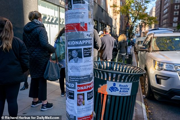 The line snaked around streets poles with posters of kidnapped Israelis